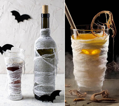 Mit alten Mullbinden kannst du Flaschen und Gläsern schnell ein gruseliges Outfit verpassen.