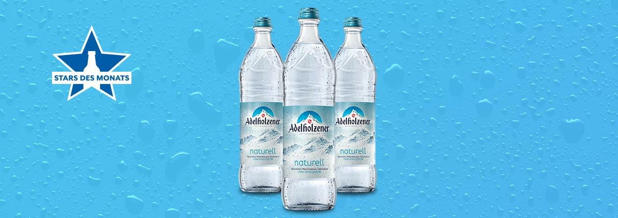 Wasserflaschen von Adelholzener naturell bei der GH Aktion Stars des Monats